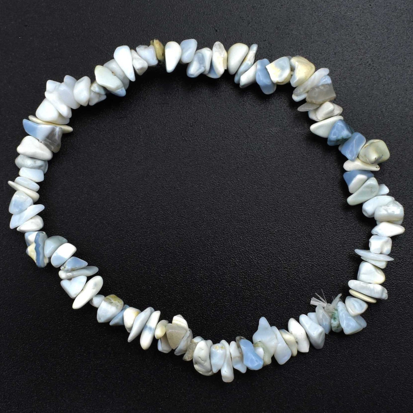 high quality bracelet made using elastic and blue opal chips. stunning pale blue, white chips with some peachy hues. 1 bracelet