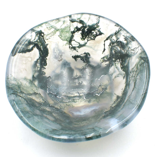 stunning green moss agate carved into a small polished bowl. green colouring is more spaced on this one so isnt as deep.stunning formations within and a wavy lining. top view