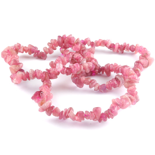 high quality bracelets made using elastic and red tourmaline chips. colour is a vibrant pink. 3 bracelet overlapping.