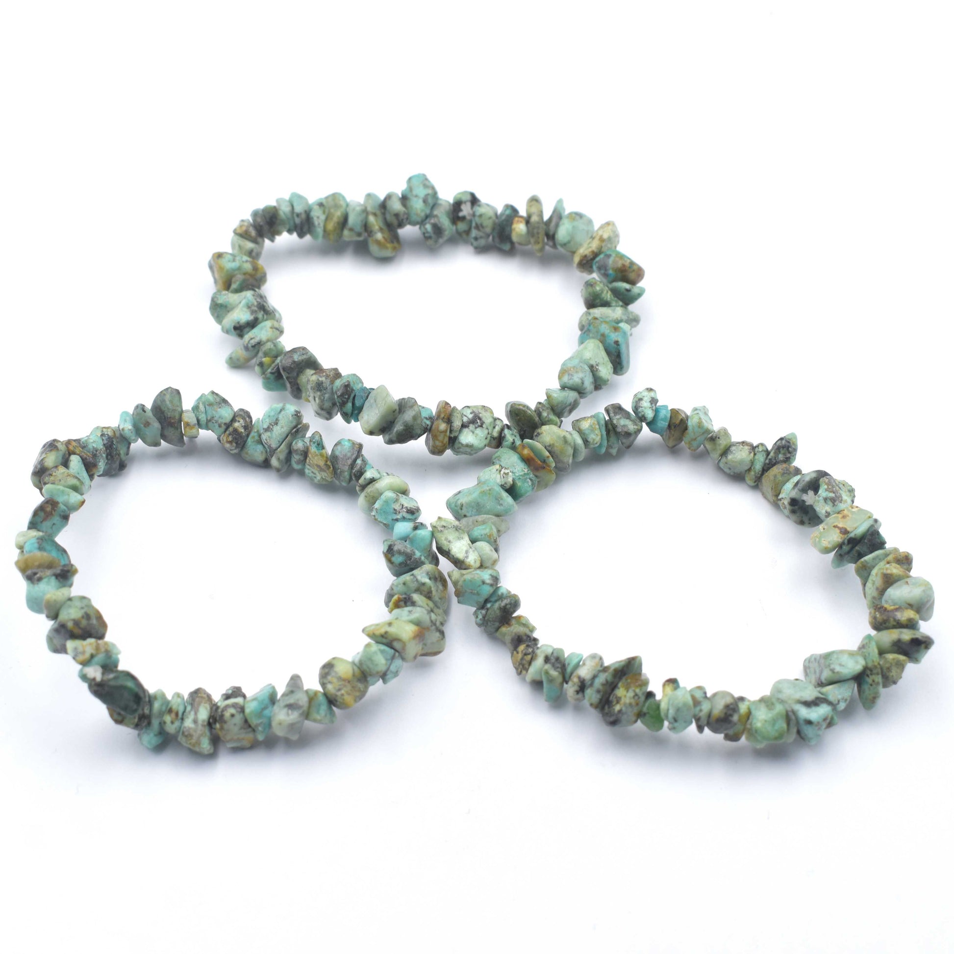 3 bracelets laying in a triangle. stunning green and black coloured elastic crystal chip bracelet. made using high quality african turquoise chips